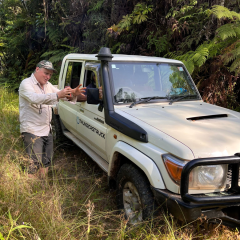 geologist discussing the spatial relationship between the numerous korokayiu vms prospects with lead field technician